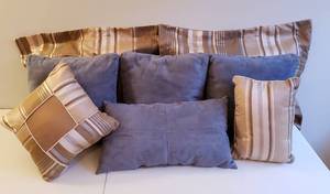 lot 4194 image: Lot of Accent Pillows - 3 Slate Blue Microfiber Suede Squares (15 in. x 15 in.), 1 Slate Blue Microfiber Suede Rectangle (21 in.x 11 in.) and 2 Striped Gold TanBlue Shams & 2 Accent Pillows - 8 total pillows