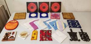 lot 4257 image: Lot of Pot holders, Metal Trivets, Tile Pot Holders and Floral Wall Decor