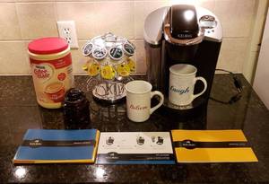 lot 4265 image: Keurig CoffeeTeaBeverage Brewer (works)with K-Cup Holder, 2 Cups, Some K-Cups and Coffee-Mate Creamer