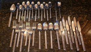 lot 4274 image: Napco Costellano Stainless Silverware (Korea) - 34 pcs.