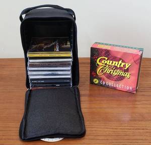 lot 4291 image: Lot of CDs with Holder