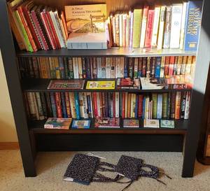 lot 4292 image: Lot of Books - HardbookSoft back - 3 Audio Books (CD), Cookbooks, Religious Books, Reference Books, Novels and 2 Cloth Book Holders - Shelving Not Included