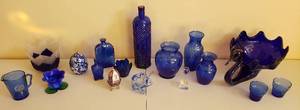 lot 4293 image: Lot of Blue Glass Collectibles - Bottles, Vases, Large Swan, Shirley Temple Pitcher, Candle Holders and Other Items