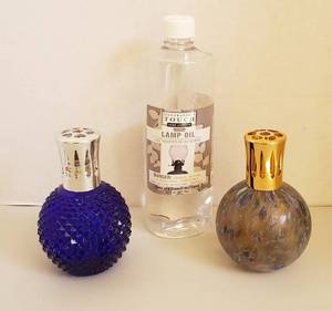 lot 4296 image: Lot of 2 Glass Globe Oil Lamps and Bottle of Lamp Oil