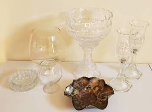 lot 4306 image: Lot of Decorative Glass Decor - Design Guild Crystal 13 in. Tall FruitPunch Bowl (Made in Poland - had small chip on bottom), Glass Candle Holders, Thistle Design Carnival Bowl, 2 Brandy Sniffers and Heavy Glass Dish