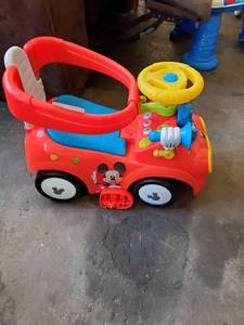 lot 7646 image: Mickey Mouse Toddler Ride-on Car