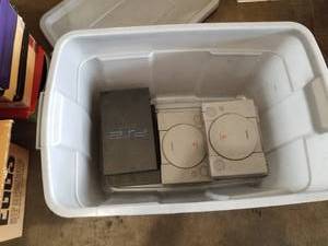 lot 7569 image: Tote of PS2 & Nintendo Consoles
