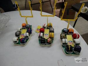 lot 4520 image: 3 sets of 1960s small football helmets- Look at team colors.