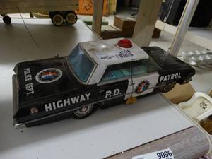 lot 4528 image: Vintage metal Police car toy