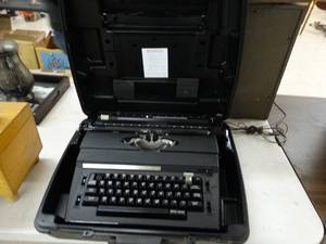 lot 4562 image: Vintage The Corrector typewriter in case