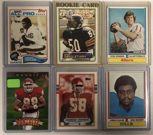 lot 1035 image: Lot of Six Stars & Hall of Famer Rookie Cards - Lawrence Taylor, Singletary, Spurrier, Derrick Thomas, Tony Gonzalez, and Ahmad Rashad