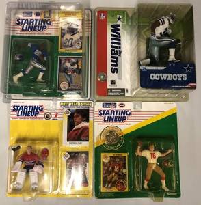 lot 1075 image: Lot of Four New in Package Sports Figures - Barry Sanders, Joe Montana, Patrick Roy Starting Lineups & Roy Williams Cowboys McFarlane