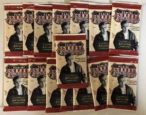 lot 1018 image: Lot of Fifteen Sealed Packs of 2011 Panini Americana With Possible Relics & Autographs - James Dean & Marilyn Monroe Possible
