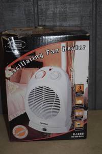 lot 127 image: Optimus Oscillating Fan Heater 1500 Watts