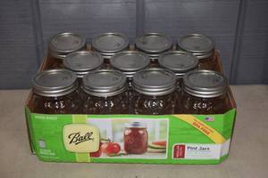 lot 411 image: 11 Ball Mason Jars with Lids Pint Regular Mouth
