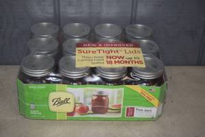 lot 404 image: 12 Ball Mason Jars with Lids Pint Regular Mouth