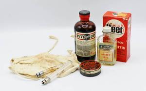 lot 2094 image: Vintage Medical - Glass Hypodermic Syringes, Surgical Mask and Very Old OTC Products