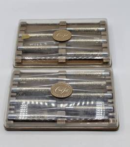 lot 2124 image: 13 Carvel Hall Steelsmiths Steak Knives Ivory Color with Silver Overlay