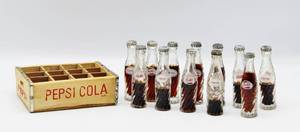 lot 2152 image: 12 Pack Vintage Miniature Pepsi Cola Bottles in Crate - Swirl Glass with Metal Caps