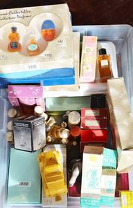 lot 2199 image: Large Lot Vintage Perfumes and Colognes - Chanel No 22 Guerlain Paris New in Box included Avon Collectible Bottles and much more
