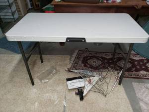 lot 5582 image: 4 ft Fold Up Table -Lifetime