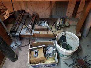 lot 5607 image: Lot of Tile Cutters , 4 Brackets with Wheels and Skilsaw