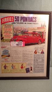 lot 5555 image: Framed Vintage Magazine Ads
