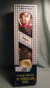 lot 5502 image: 16 Porcelain Doll