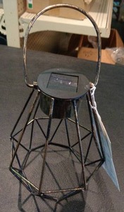 lot 4031 image: Sutton Rowe Solar Lightbulb with Triangle Cage
