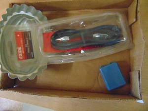 lot 1200 image: Jello Mold, Battery Cable, and Pin