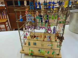 lot 1225 image: Spinning Rack of Earings and Bracelets