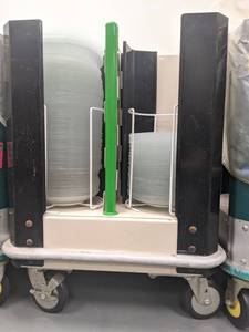 lot 1784 image: Rolling Dish Crate With 9 Inch Clear Plates