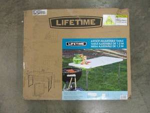 lot 11 image: 4ft adjustable height table