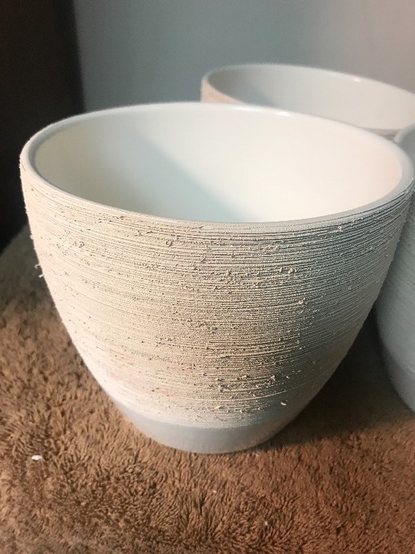 lot 1051 image: Four new ceramic pots textured on outside smooth glaze surface on inside