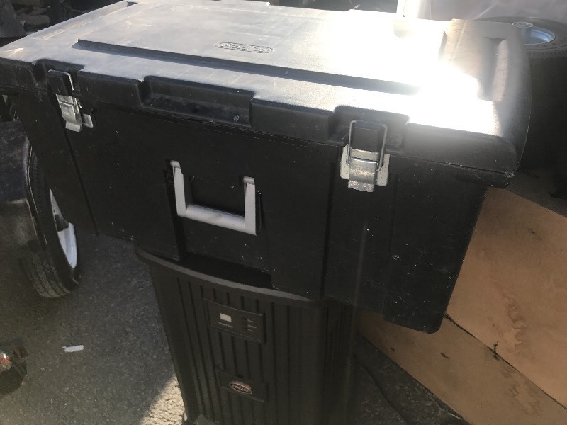 lot 1066 image: Plastic tote with handles and wheels great storage for toolbox as bitch