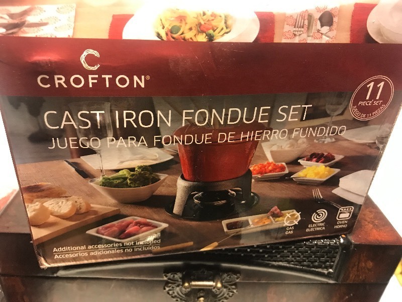 lot 1084 image: Cast iron fondue set