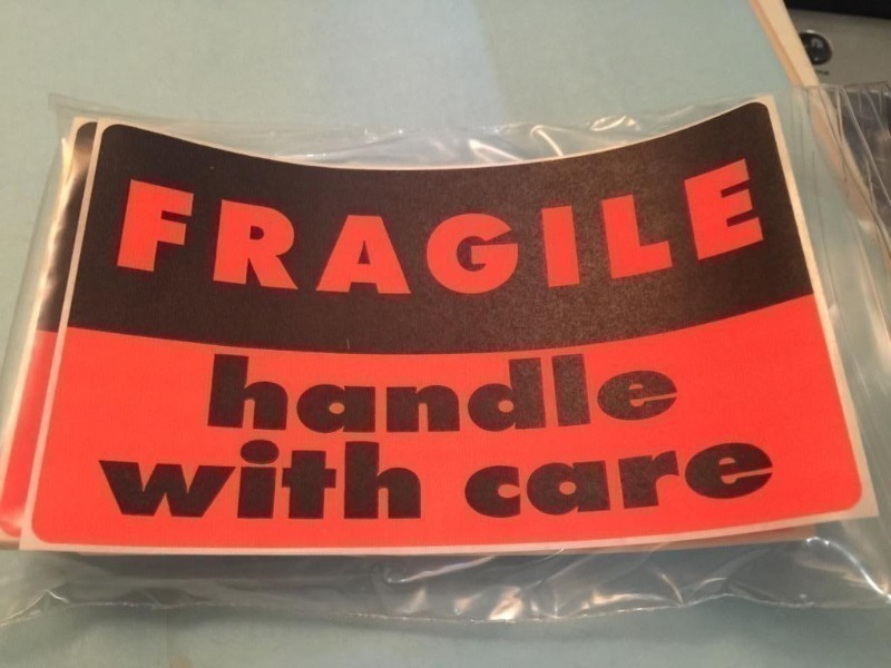 lot 123 image: Six packs of 40 bright fragile handle with ca...