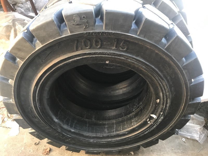lot 348 image: New 7.00-15  solid forklift tire high dollar