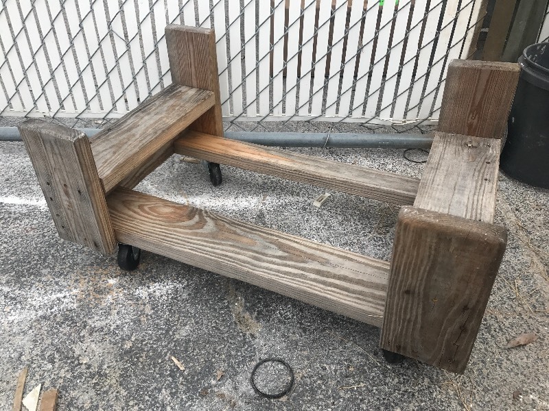 lot 57 image: Wooden furniture style dolly would be great for Sea-Doo dolly in your shop or a garage or cut down to be flat use your imagination heavy duty
