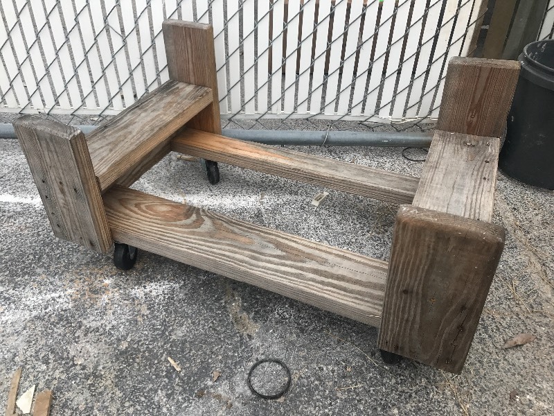 lot 58 image: Wooden furniture style dolly would be great for Sea-Doo dolly in your shop or a garage or cut down to be flat use your imagination heavy duty