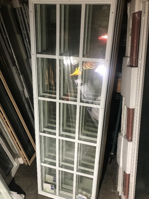 lot 63 image: New 20 x 64 thermal pane window use your imagination great door inserts high dollar items