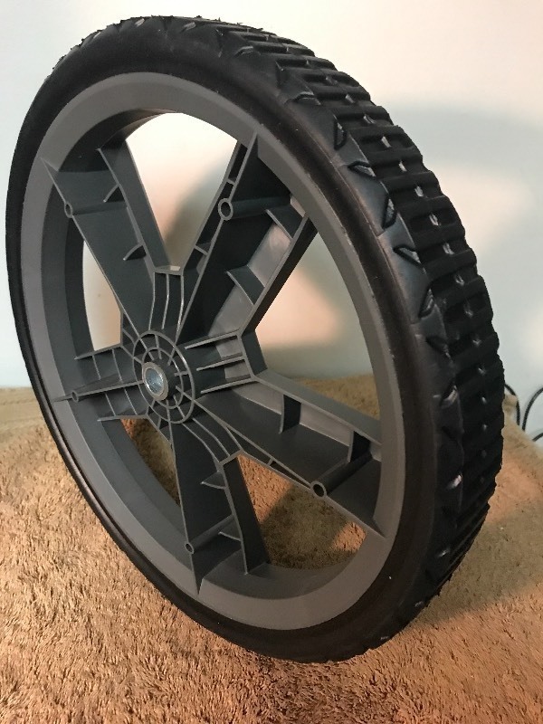lot 78 image: Nice new 12 inch wheel with bearings would make great gate wheel or use your imagination