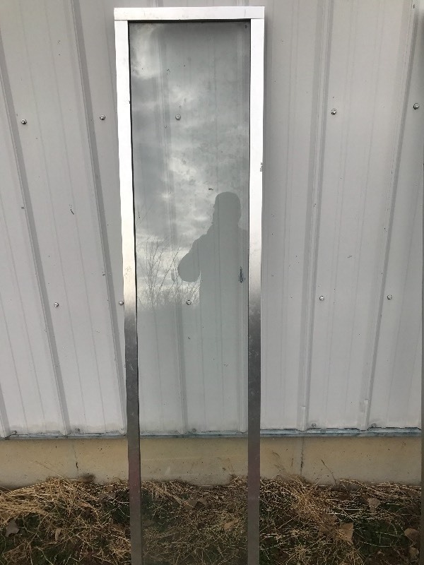 lot 8 image: Two aluminum framed glass panels 1 x 5 use your imagination