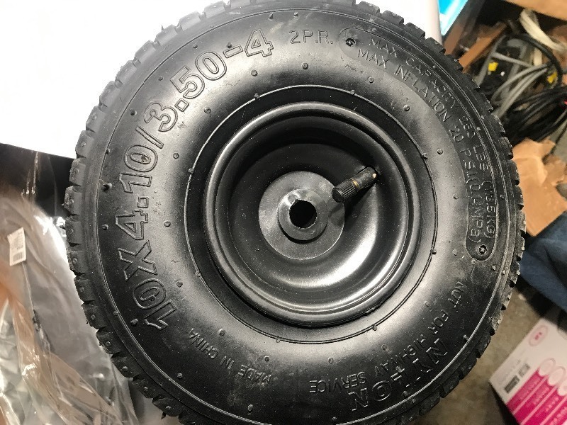 lot 816 image: New tire and rim see picture for size