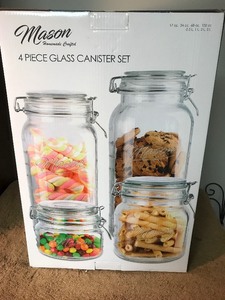 lot 126 image: Four piece set of glass canisters