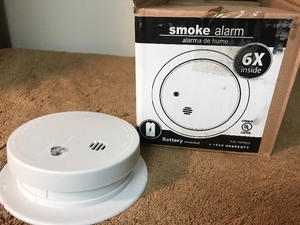lot 133 image: Case six smoke detectors as pictured