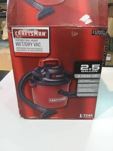 lot 3311 image: Portable Wall Mount WetDry Vac 2.5 Gallon