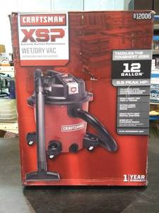 lot 9057 image: XSP Wet  Dry Vac 12 Gallon 5.5 hp