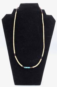 lot 30 image: Turquoise and Puka Shell Necklace
