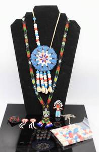 lot 34 image: Leather Backed Beaded Native American Rosette Necklace and other beaded items